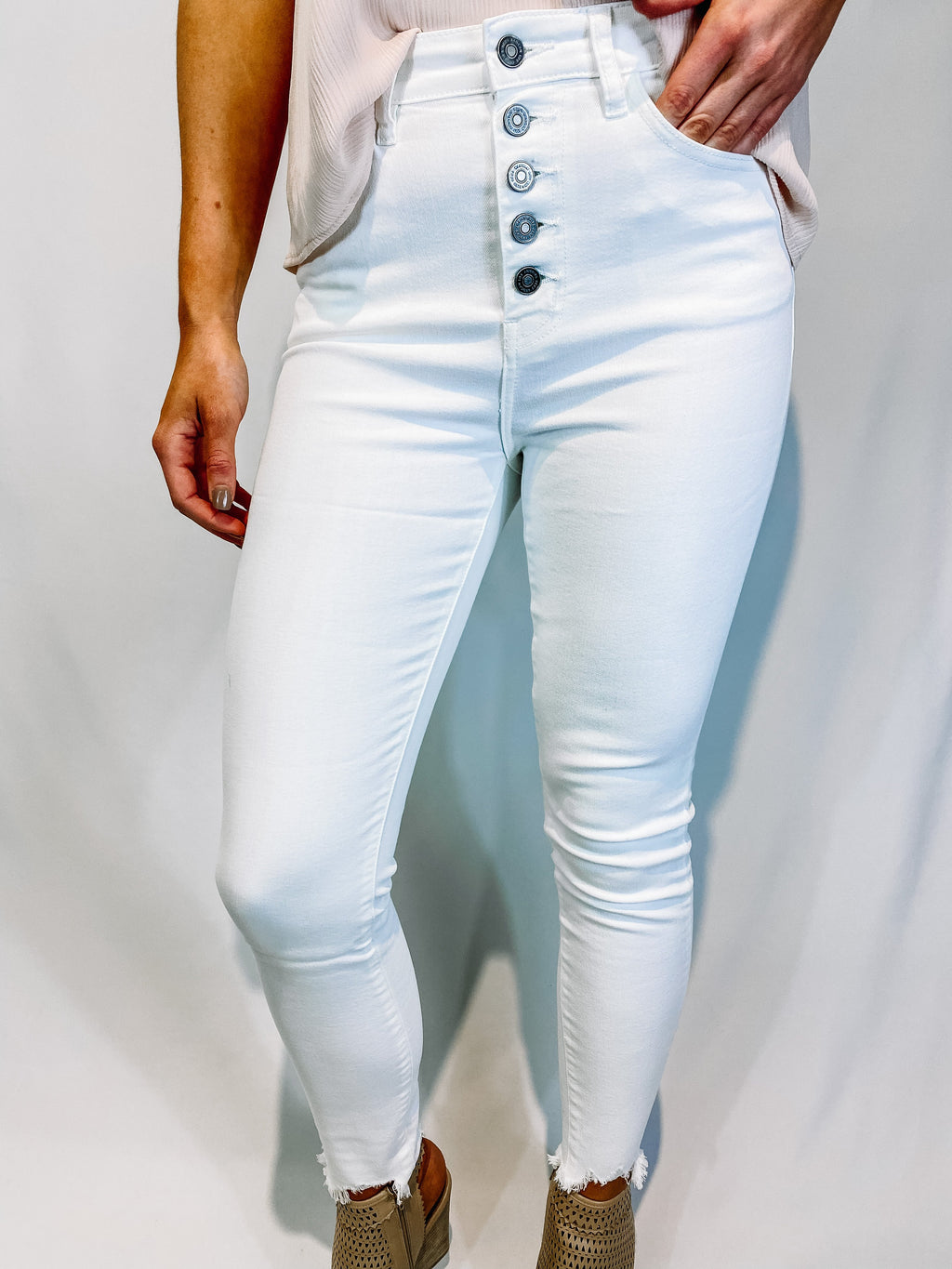 <img src="White-High-Rise-Stretch-Ankle-Skinny-Jeans-Front.jpg" alt="white high rise ankle skinny jeans front view">